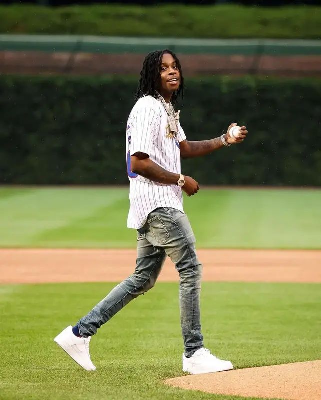 Polo G outfit in Nike, Purple Brand, and Rawlings, 2021