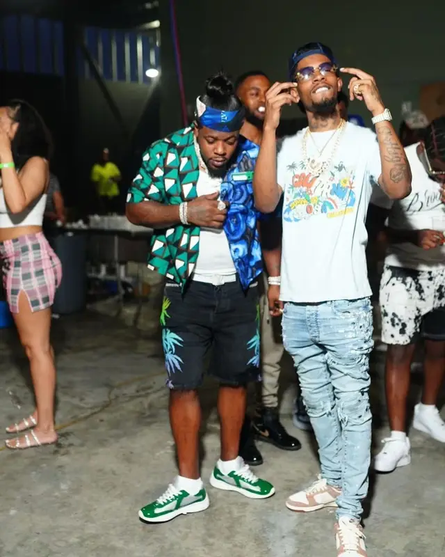 Rowdy Rebel outfit in Amiri, Prada, and Louis Vuitton, 2021