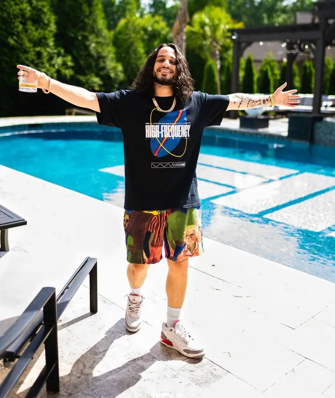 Russ outfit in Blood Brother, Puma, and KidSuper, 2021
