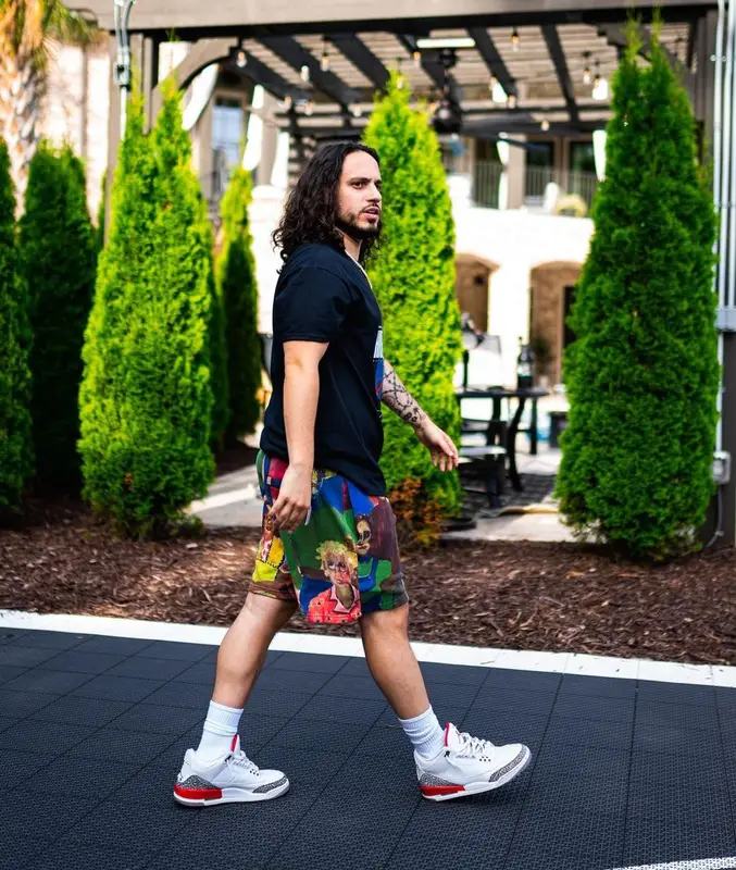 Russ outfit in Blood Brother, Puma, and KidSuper, 2021