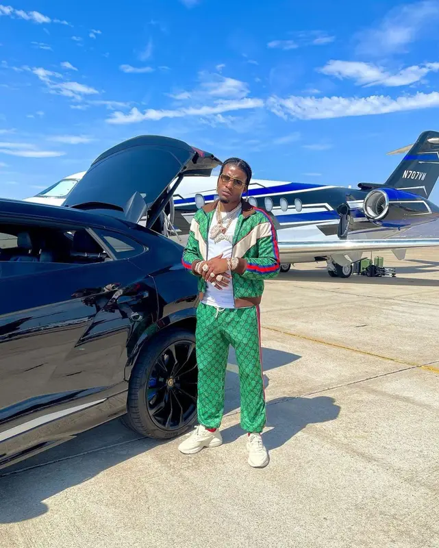 CJ So Cool outfit in Gucci, Louis Vuitton, and Balenciaga, 2021