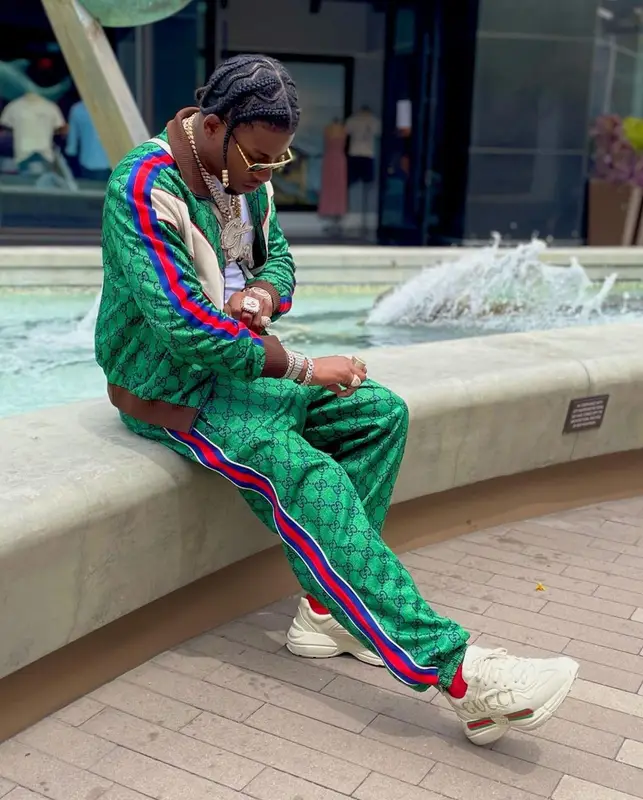 CJ So Cool outfit in Gucci, Louis Vuitton, and Balenciaga, 2021