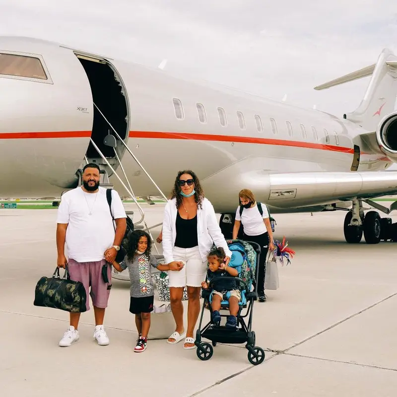 DJ Khaled outfit in Ralph Lauren, Stone Island, and Louis Vuitton, 2021