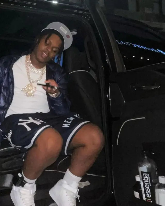 42 Dugg outfit in Moncler, Pro Standard, and New Era, 2021