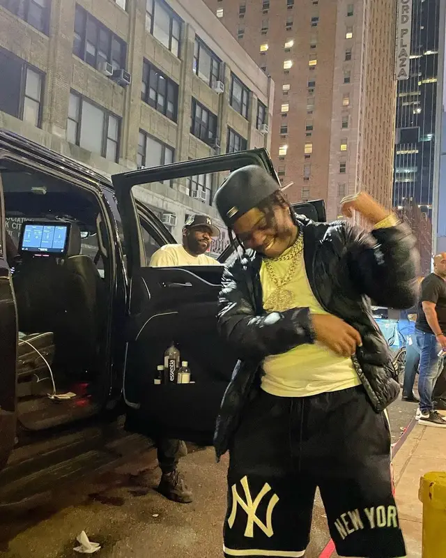 42 Dugg outfit in Moncler, Pro Standard, and New Era, 2021