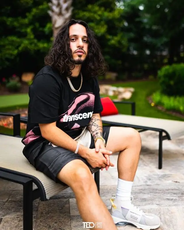 Russ outfit in OAMC, Puma, and KidSuper, 2021