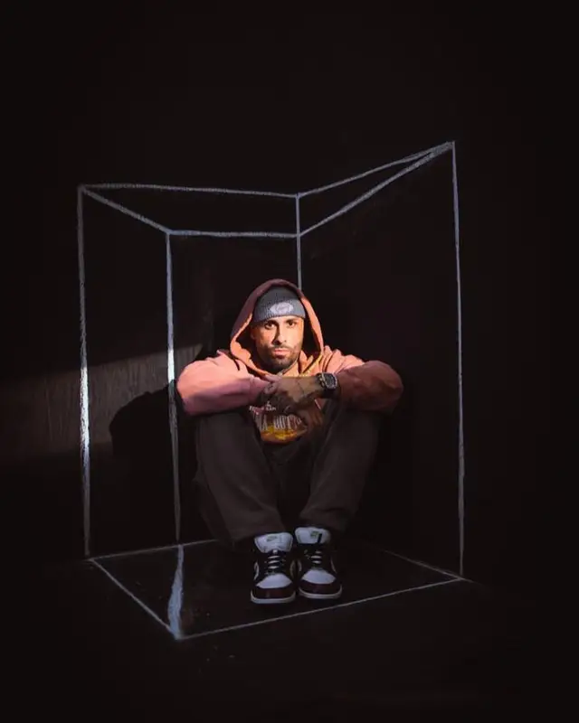 Nicky Jam outfit in Other Scenes, Supreme, and Nike, 2021