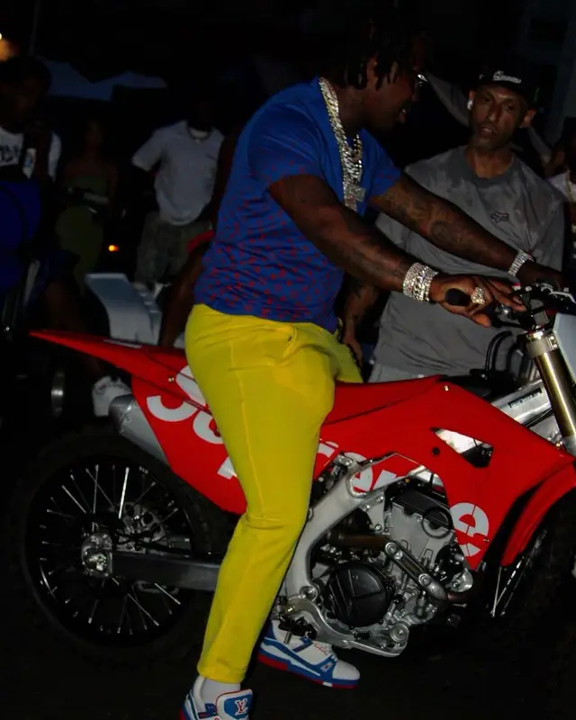 EST Gee outfit in Louis Vuitton, Palm Angels, and Cartier, 2021