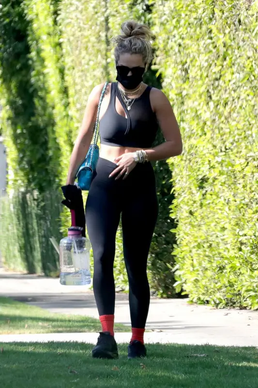 Rita Ora outfit in Nike, Chanel, and Cartier, 2021