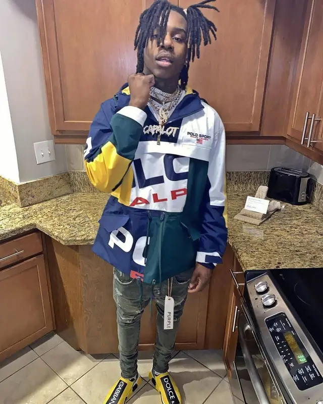 Polo G outfit in Polo Ralph Lauren, Purple Brand, and Dolce & Gabbana, 2021