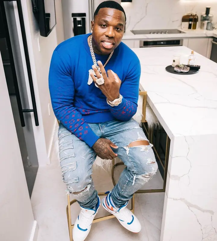 BandMan Kevo outfit in Louis Vuitton and Amiri, 2021