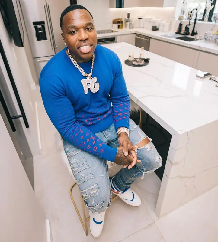 BandMan Kevo outfit in Louis Vuitton and Amiri, 2021