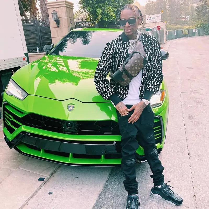 Soulja Boy outfit in Amiri, Louis Vuitton, and Playboy, 2021