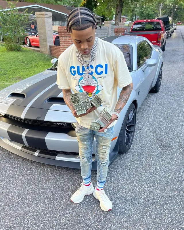 Lil Migo outfit in Gucci and Doraemon, 2021