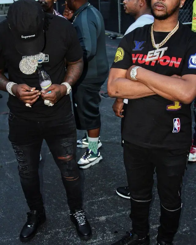 EST Gee outfit in Kaws, Amiri, and Supreme, 2021