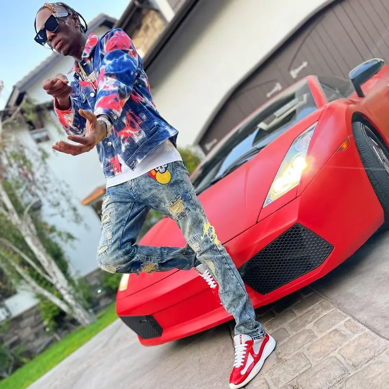 Soulja Boy outfit in FashionNova, Prada, and Louis Vuitton, 2021