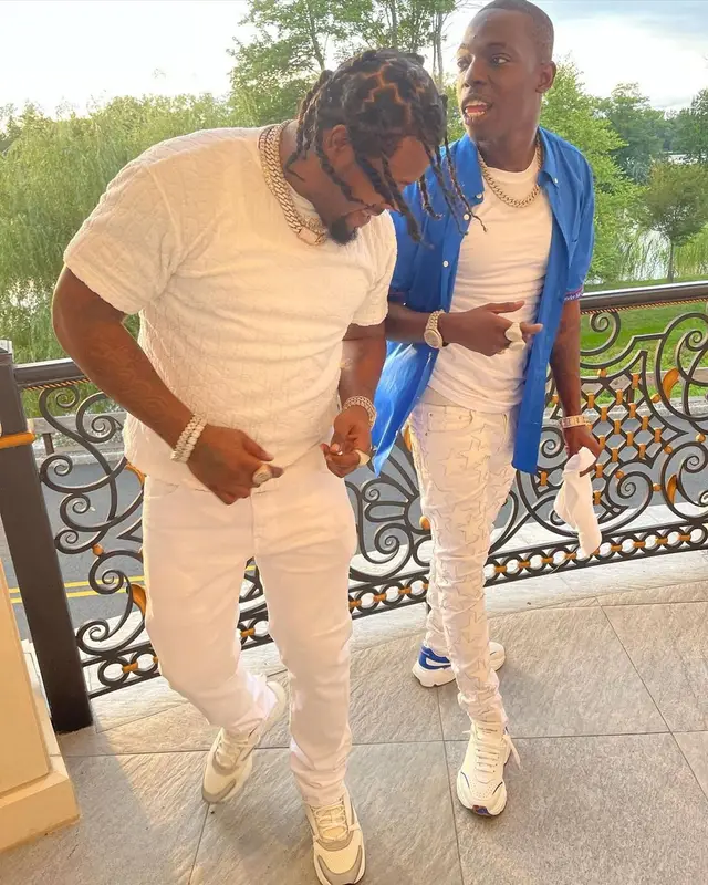 Bobby Shmurda outfit in Alexander McQueen, Amiri, and Louis Vuitton, 2021