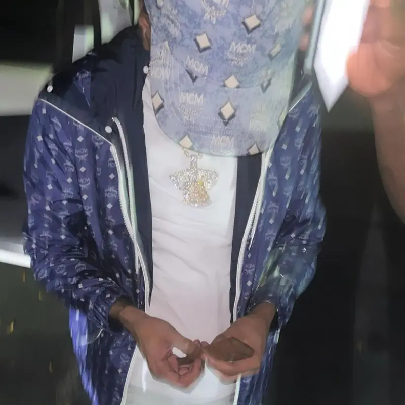 Lil Poppa outfit in Ksubi, Nike, and MCM, 2021