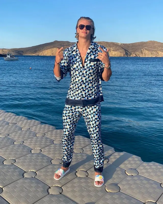 Erling Haaland outfit in Dolce & Gabbana, Rolex, and Louis Vuitton, 2021