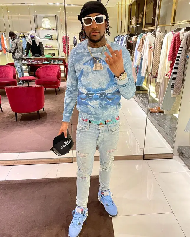Ron Suno outfit in Burberry, Amiri, and Louis Vuitton, 2021