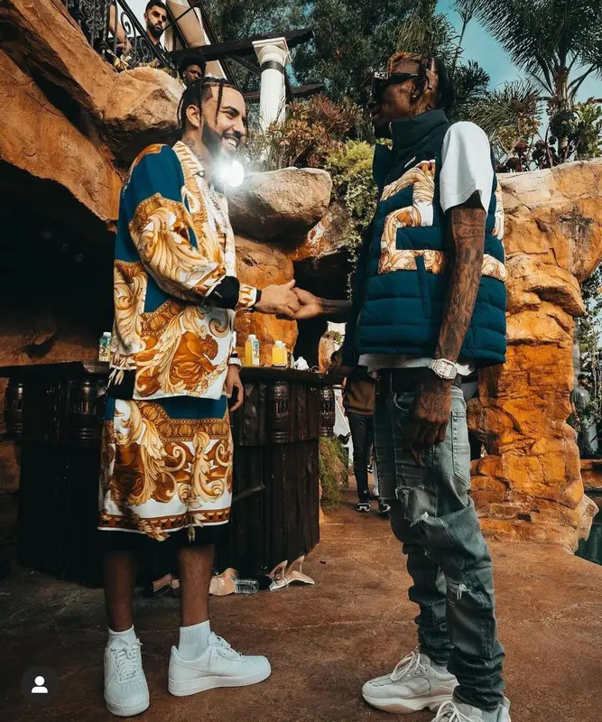 Soulja Boy outfit in Versace, Amiri, and Louis Vuitton, 2021