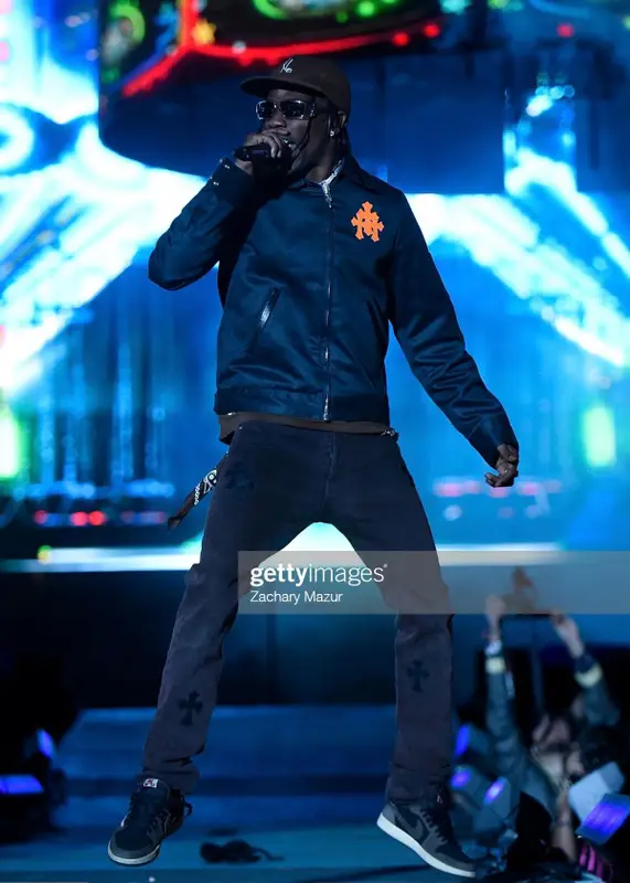Travis Scott outfit in Chrome Hearts, Rick Owens, and Travis Scott Merch, 2019