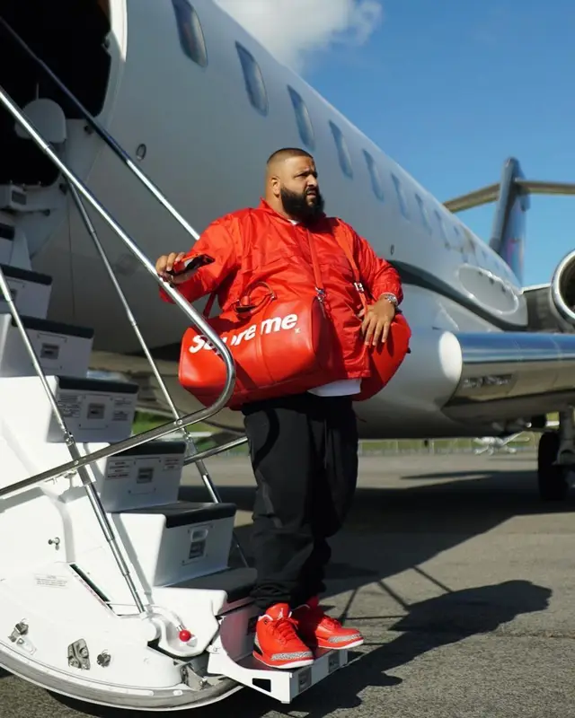 DJ Khaled outfit in Nike, Supreme, and Louis Vuitton, 2021