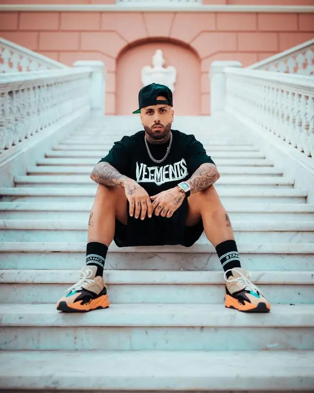 Nicky Jam outfit in Vetements, Adidas, and Stance, 2021