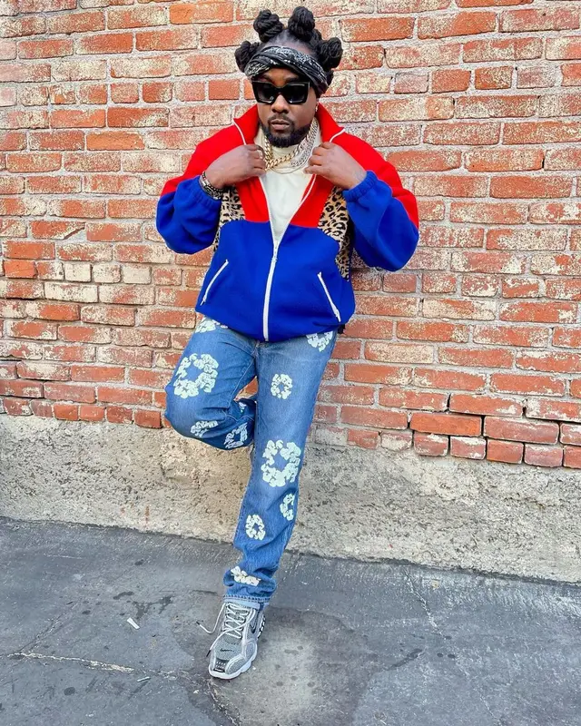 Wale outfit in Celine, Levi’s, and Denim Tears, 2021