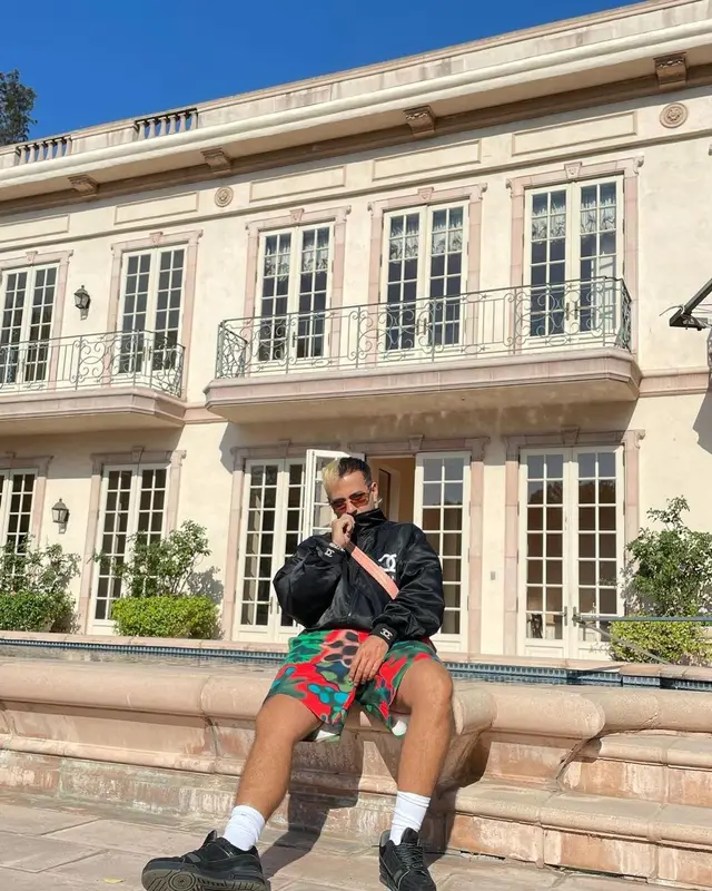 Feid outfit in Brain Dead, Cartier, and Nike, 2021