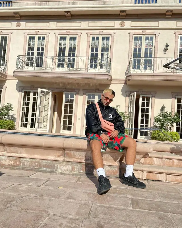 Feid outfit in Brain Dead, Cartier, and Nike, 2021