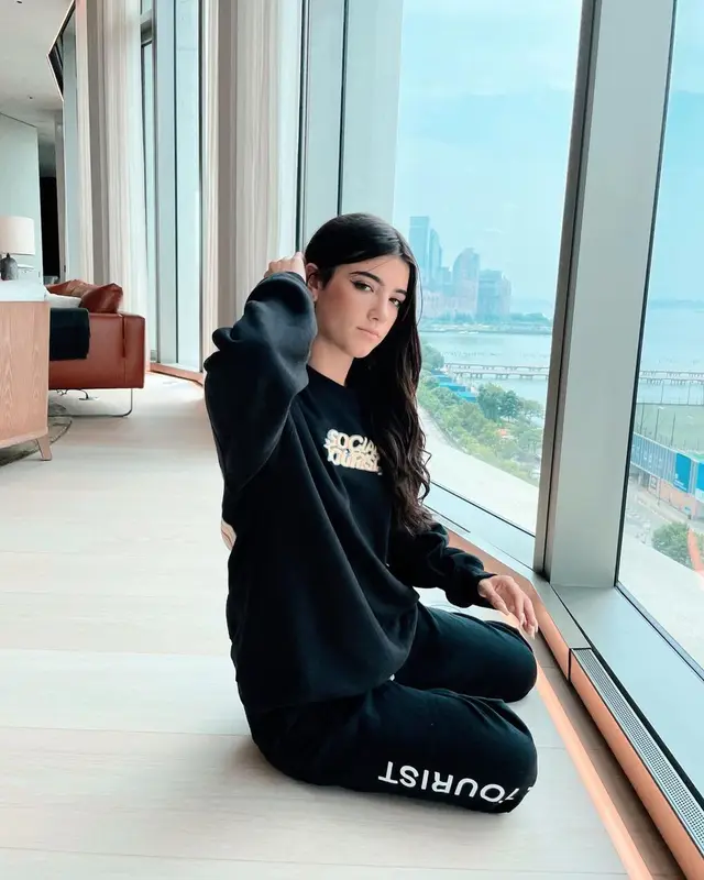 Charli D'Amelio outfit in Social Tourist and Nike, 2021