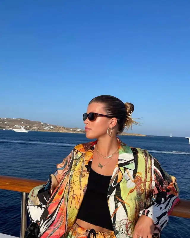 Sofia Richie outfit in Christopher Kane, The Attico, and Linda Farrow, 2021