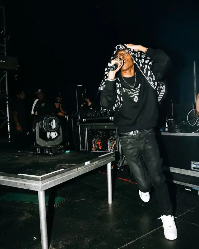 Lil Tecca outfit in Prada, Ray-Ban, and Alexander McQueen, 2021
