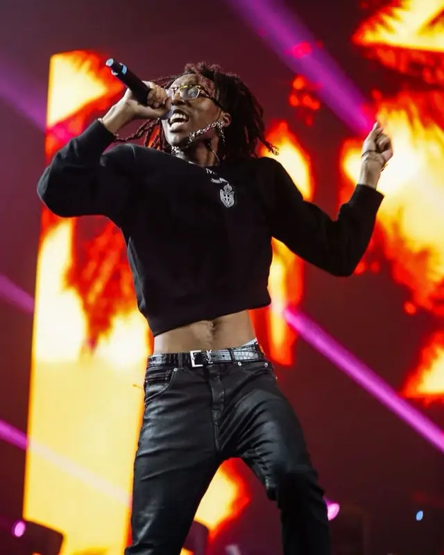 Lil Tecca outfit in Prada, Ray-Ban, and Alexander McQueen, 2021