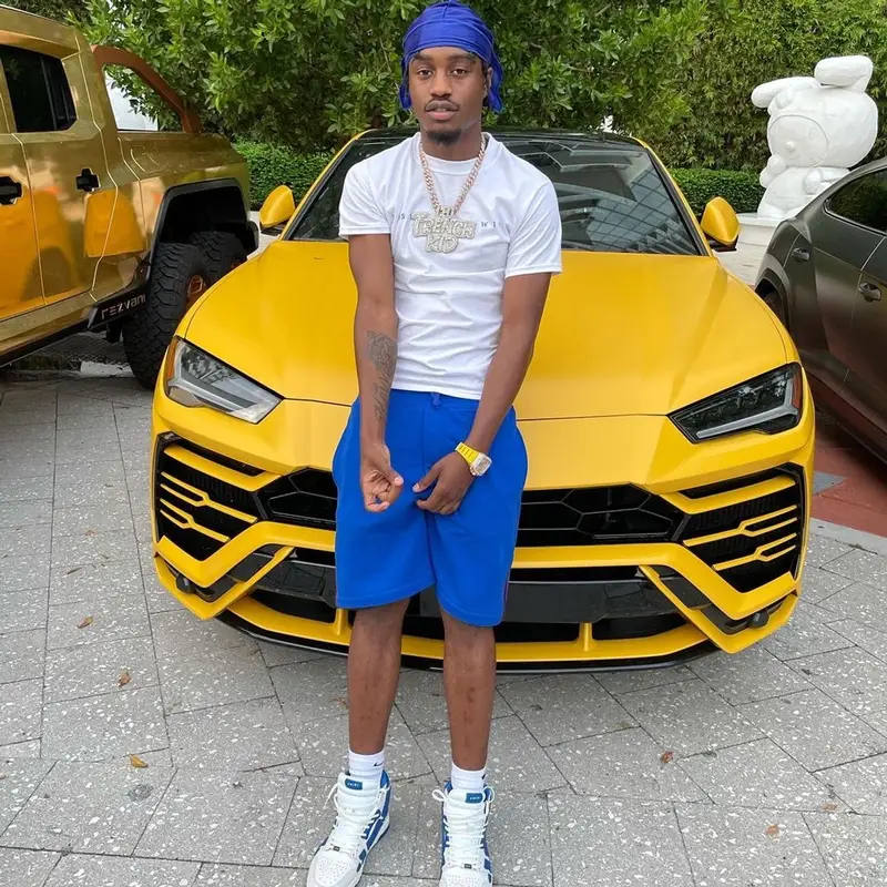 Lil Tjay outfit in Alexander McQueen, Amiri, and Nike, 2021