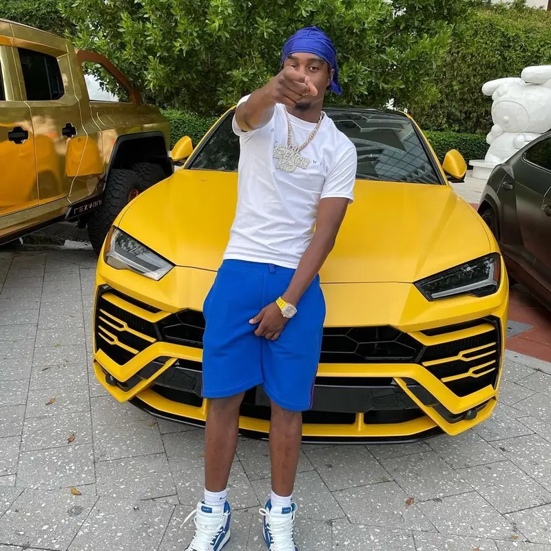 Lil Tjay outfit in Alexander McQueen, Amiri, and Nike, 2021