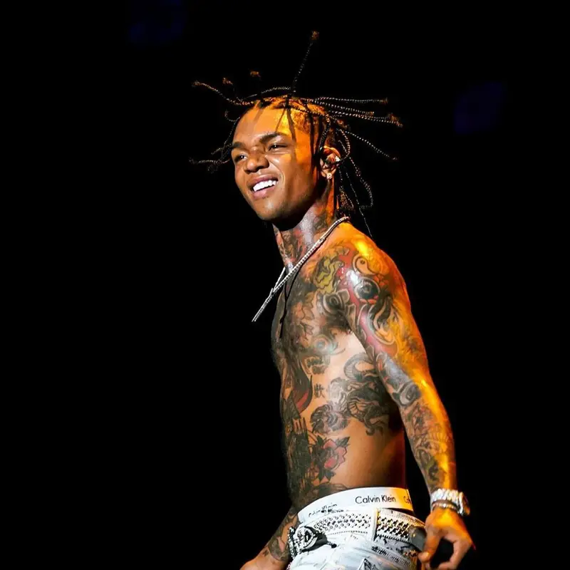 Swae Lee outfit in Purple Brand, B.B. Simon, and Calvin Klein, 2021