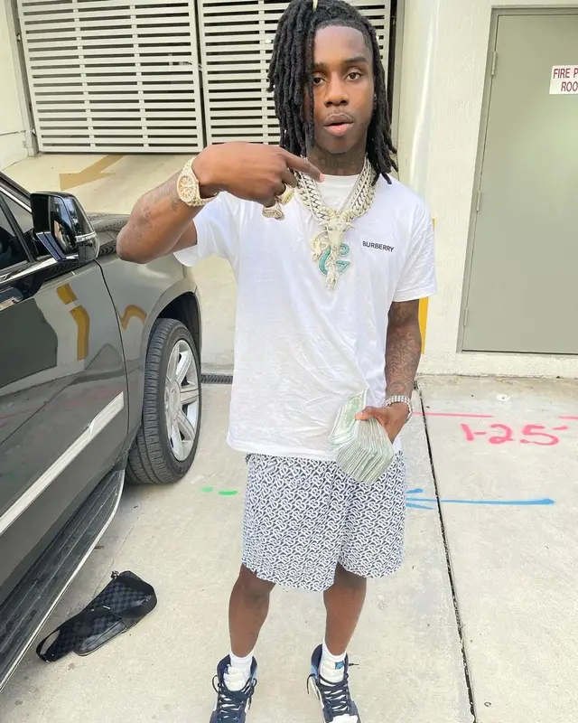 Polo G outfit in Burberry, Nike, and Louis Vuitton, 2021