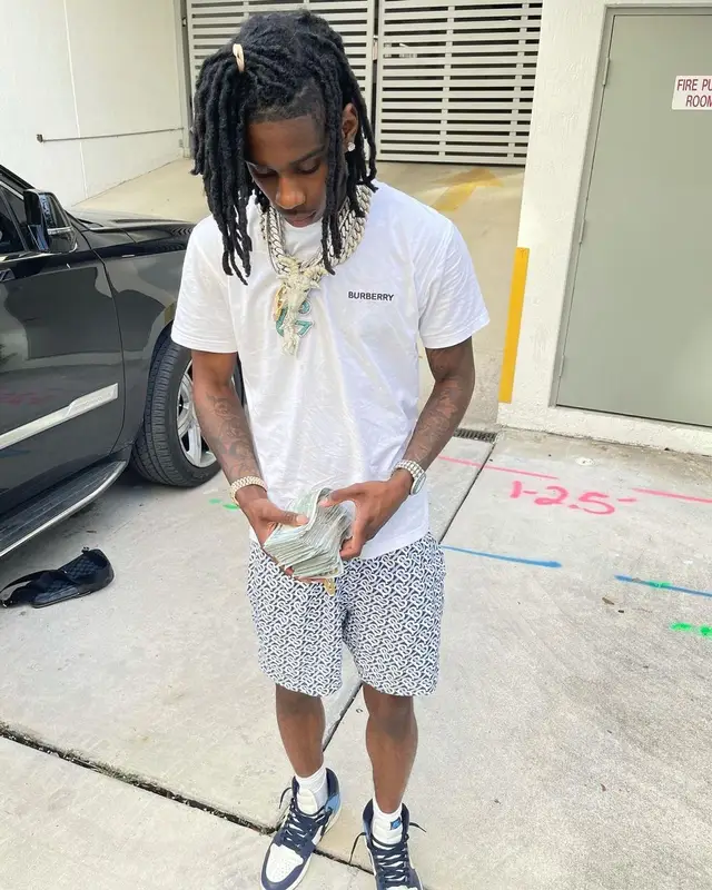 Polo G outfit in Burberry, Nike, and Louis Vuitton, 2021