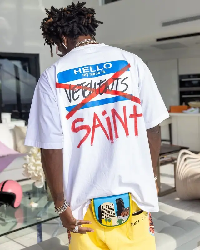 Saint JHN outfit in Vetements, Bottega Veneta, and Christian Sex Club, 2021
