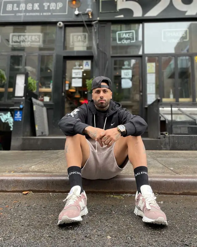 Nicky Jam outfit in Nike, Kith, and Balenciaga, 2021