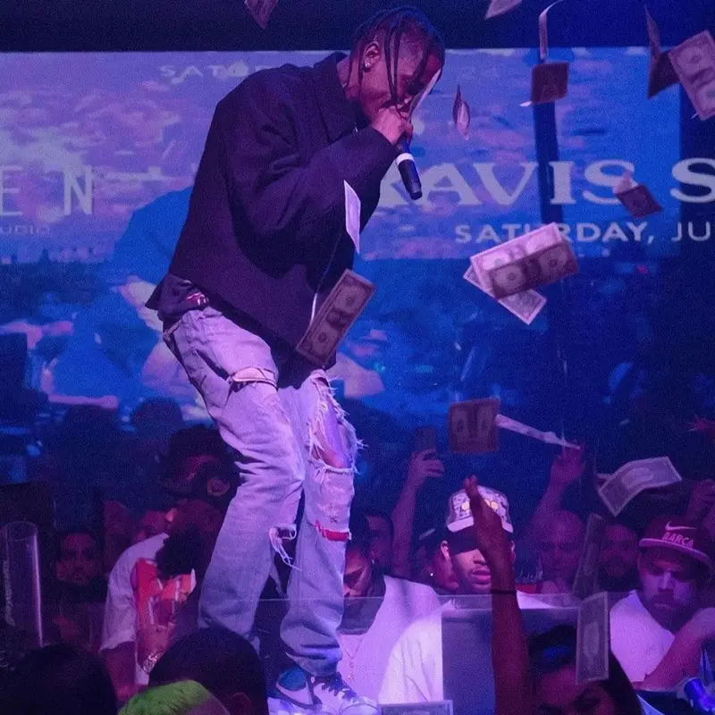 Travis Scott outfit in Bottega Veneta, Vintage, and Undercover, 2021