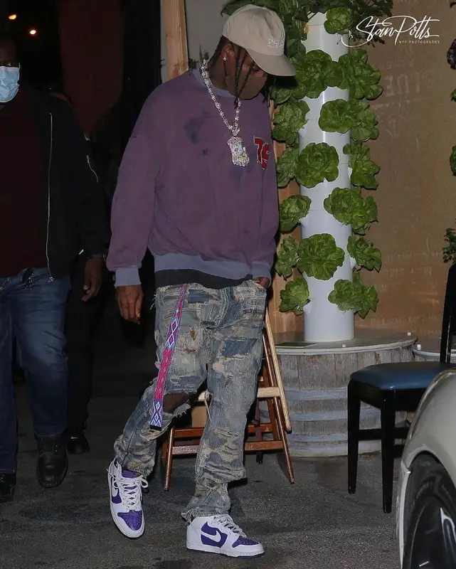 Travis Scott outfit in Raf Simons, Undercover, and Space Village, 2021