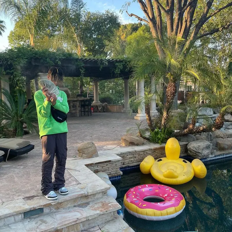 Kashdami outfit in Young Thug Merch, Supreme, and Spider Worldwide, 2021