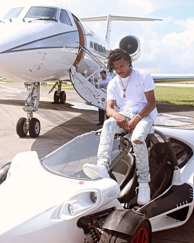 Lil Baby outfit in Golden Goose, Amiri, and Chemist, 2021