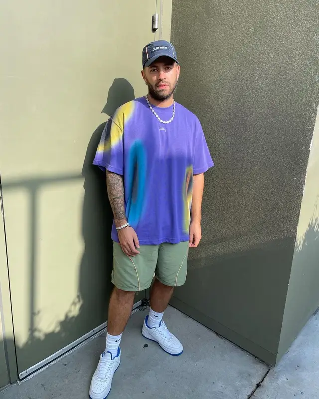 Feid outfit in A-Cold-Wall*, Supreme, and Nike, 2021