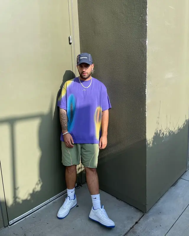 Feid outfit in A-Cold-Wall*, Supreme, and Nike, 2021