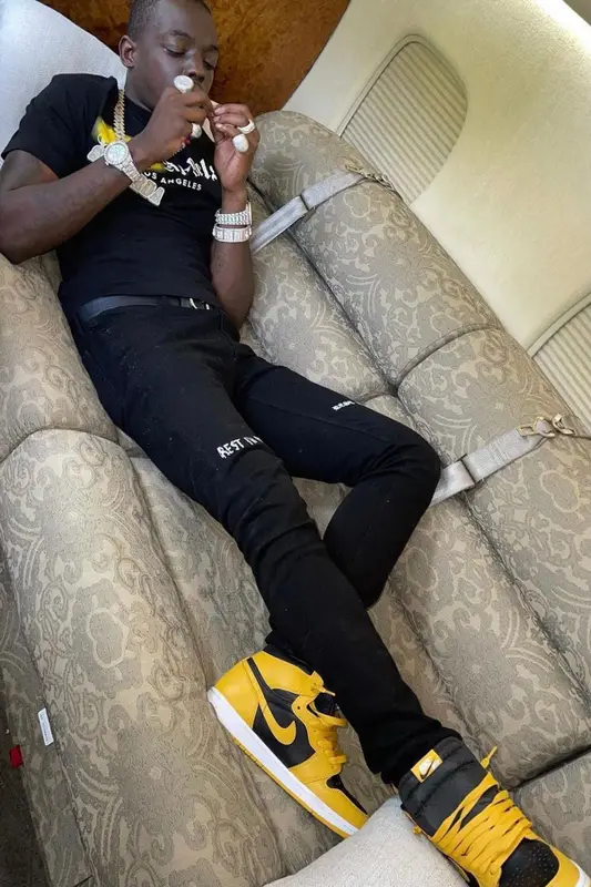 Bobby Shmurda outfit in Palm Angels, Rta, and Dior, 2021