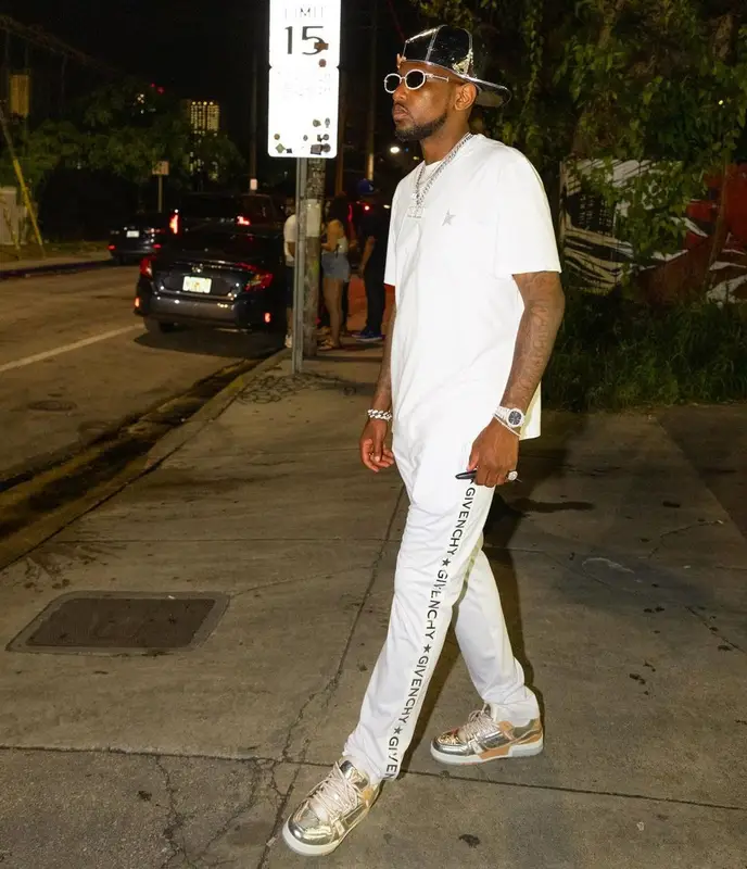 Fabolous outfit in Golden Goose, Cartier, and Louis Vuitton, 2021